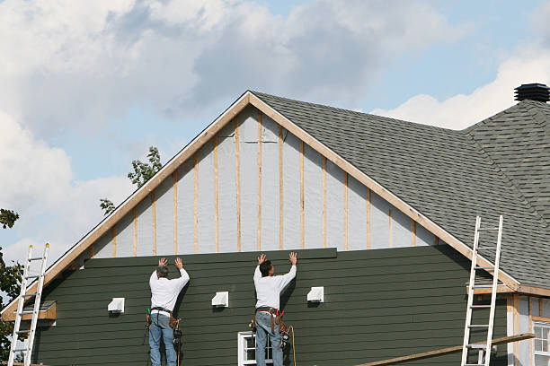 Professional Emergency Siding Repair technician working in Morrison, IL